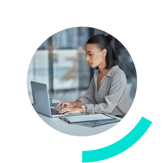 woman focused working on a laptop